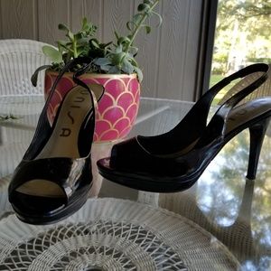 Black slingback pumps in great condition